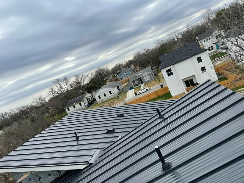 Standing seam metal roof panels with vents for Skylight Repair in Dayton